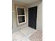 Home entrance featuring a black security door and neutral toned walls at 555 E Silverado Ranch Blvd # 1034, Las Vegas, NV 89183