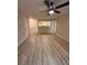 Bright living room with light wood floors and ceiling fan at 555 E Silverado Ranch Blvd # 1034, Las Vegas, NV 89183