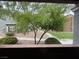 Balcony view of community landscaping and green spaces at 555 E Silverado Ranch Blvd # 1034, Las Vegas, NV 89183