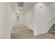 Bright hallway with neutral carpeting, white walls, and recessed lighting at 5713 Silver Cascade Ave, Las Vegas, NV 89131