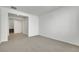 Open living room with carpet flooring at 5713 Silver Cascade Ave, Las Vegas, NV 89131