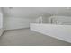 Loft area with carpet flooring and ample natural light at 5713 Silver Cascade Ave, Las Vegas, NV 89131