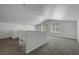 Spacious loft area with carpet flooring and natural light at 5713 Silver Cascade Ave, Las Vegas, NV 89131