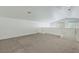 Open loft area has neutral carpet, white walls, high ceilings and a railing overlooking the downstairs at 5713 Silver Cascade Ave, Las Vegas, NV 89131