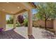 Covered patio featuring paver flooring, recessed lighting, and a well-manicured backyard at 5713 Silver Cascade Ave, Las Vegas, NV 89131