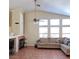 Bright living room with high ceilings, fireplace, and large windows for plenty of natural light at 5900 Red Umber Ave, Las Vegas, NV 89130