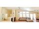 Bright living room with high ceilings, fireplace, and large windows for plenty of natural light at 5900 Red Umber Ave, Las Vegas, NV 89130