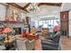 Inviting lounge area featuring a cozy fireplace, plush seating, and stylish decor for residents to enjoy at 6001 Falconer Ave, Las Vegas, NV 89122