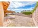 A large plot of land with a partially covered patio, perfect for outdoor activities and relaxation at 632 Arrayo Way, Boulder City, NV 89005