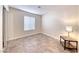This bedroom features tile floors and a neutral color palette at 632 Arrayo Way, Boulder City, NV 89005