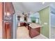 Beautifully updated kitchen with stainless steel appliances, granite counters and tiled flooring at 632 Arrayo Way, Boulder City, NV 89005