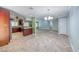 Kitchen with modern stainless range and exhaust hood that flows into a larger living space at 632 Arrayo Way, Boulder City, NV 89005