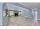 Living area features a fireplace, tile flooring, and views of the kitchen at 632 Arrayo Way, Boulder City, NV 89005