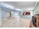 Large living space with tile flooring, fireplace, and a view into the kitchen at 632 Arrayo Way, Boulder City, NV 89005