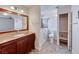 The main bathroom features a walk in tub and adjacent closet for storage at 632 Arrayo Way, Boulder City, NV 89005