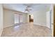The main bedroom features access to the ensuite bathroom, patio access and a ceiling fan at 632 Arrayo Way, Boulder City, NV 89005