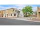 Street view featuring multiple single-Gathering homes with xeriscaping and garages at 6928 Smiling Cloud Ave, Henderson, NV 89011