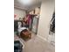 Walk-in closet featuring plenty of storage with shelves and rods at 7527 Ardenno St, North Las Vegas, NV 89084
