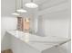 Elegant bar area with marble countertops and modern lighting, perfect for entertaining guests at 7616 Gossamer Wind St, Las Vegas, NV 89139