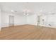 Bright bedroom features hardwood floors, neutral paint, and recessed lighting at 7616 Gossamer Wind St, Las Vegas, NV 89139