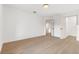 This bedroom features hardwood floors and a closet with white doors at 7616 Gossamer Wind St, Las Vegas, NV 89139