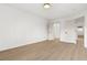 This bedroom features hardwood floors and a closet at 7616 Gossamer Wind St, Las Vegas, NV 89139
