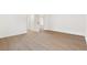 This bedroom features hardwood floors and closet access at 7616 Gossamer Wind St, Las Vegas, NV 89139