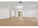 Large bedroom featuring neutral walls and hardwood flooring at 7616 Gossamer Wind St, Las Vegas, NV 89139