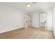 A clean bedroom features neutral walls and wood-look floors at 7616 Gossamer Wind St, Las Vegas, NV 89139