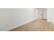 Bedroom features neutral walls and wood-look floors at 7616 Gossamer Wind St, Las Vegas, NV 89139