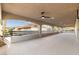 An enormous covered outdoor patio with modern ceiling fan at 7616 Gossamer Wind St, Las Vegas, NV 89139