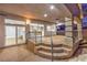 An elegant outdoor patio with stone steps that lead to a covered seating area at 7616 Gossamer Wind St, Las Vegas, NV 89139