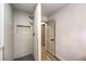 This is a modern shower featuring tile and a built-in shelf, with elegant fixtures at 7616 Gossamer Wind St, Las Vegas, NV 89139