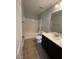 Standard bathroom featuring a single sink vanity and a shower-tub combo at 7733 Donner Peak St, Las Vegas, NV 89166