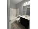 Clean bathroom featuring a tub-shower combination and modern vanity at 7733 Donner Peak St, Las Vegas, NV 89166