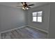 Bright bedroom with a ceiling fan and a window that allows natural light at 7733 Donner Peak St, Las Vegas, NV 89166