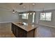Bright kitchen featuring a center island with pendant lighting and open layout at 7733 Donner Peak St, Las Vegas, NV 89166