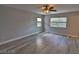 Bright main bedroom offering ceiling fan, tile floors, and natural light at 7733 Donner Peak St, Las Vegas, NV 89166
