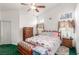 Bedroom with vaulted ceilings and dual windows at 7874 Trail Boss Ct, Las Vegas, NV 89113