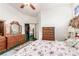 Bedroom with vaulted ceilings and furniture at 7874 Trail Boss Ct, Las Vegas, NV 89113