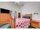 Cozy bedroom features comfortable furnishings, natural light, and a relaxing atmosphere at 7874 Trail Boss Ct, Las Vegas, NV 89113