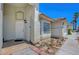Charming home featuring a tiled roof, front door entry, and a two-car garage at 7874 Trail Boss Ct, Las Vegas, NV 89113