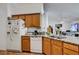 Traditional style kitchen featuring wood cabinets, granite countertops, and stainless steel appliances at 7874 Trail Boss Ct, Las Vegas, NV 89113