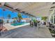 Inviting pool with covered patio is perfect for outdoor living at 7874 Trail Boss Ct, Las Vegas, NV 89113