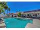 Sparkling pool offers a refreshing escape, surrounded by lush landscaping at 7874 Trail Boss Ct, Las Vegas, NV 89113