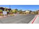 The Fulton Park gated entrance with lush landscaping and attractive architecture at 8324 W Charleston Blvd # 1036, Las Vegas, NV 89117