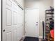 Practical entryway with storage solutions, including closet and shoe rack at 8324 W Charleston Blvd # 1036, Las Vegas, NV 89117