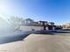 View of the townhomes featuring attached garages and well maintained landscaping at 8324 W Charleston Blvd # 1036, Las Vegas, NV 89117