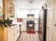 Bright kitchen featuring stainless steel appliances, white cabinets, and modern countertops at 8324 W Charleston Blvd # 1036, Las Vegas, NV 89117