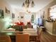 Open-concept living and dining area with neutral tones and cozy furniture at 8324 W Charleston Blvd # 1036, Las Vegas, NV 89117